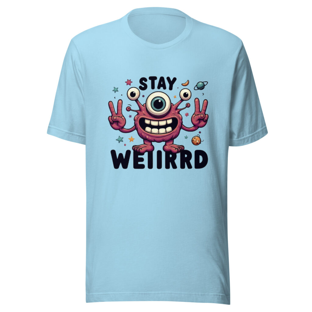 T-shirt featuring a one-eyed monster throwing peace signs, with the words 'Stay Weird', surrounded by stars and planets.